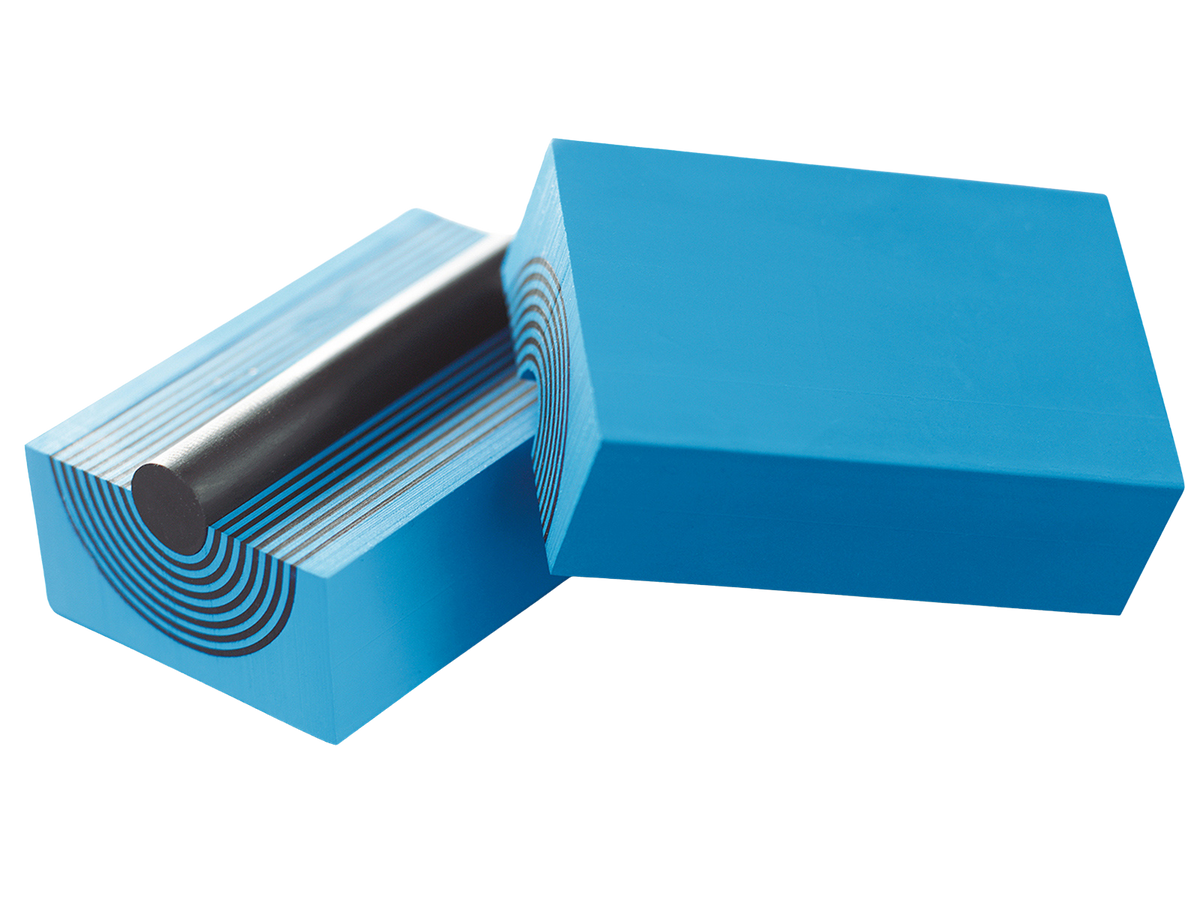 Roxtec sealing modules consist of two halves with removable layers and a center core which is removed when it is time to route a cable or pipe.